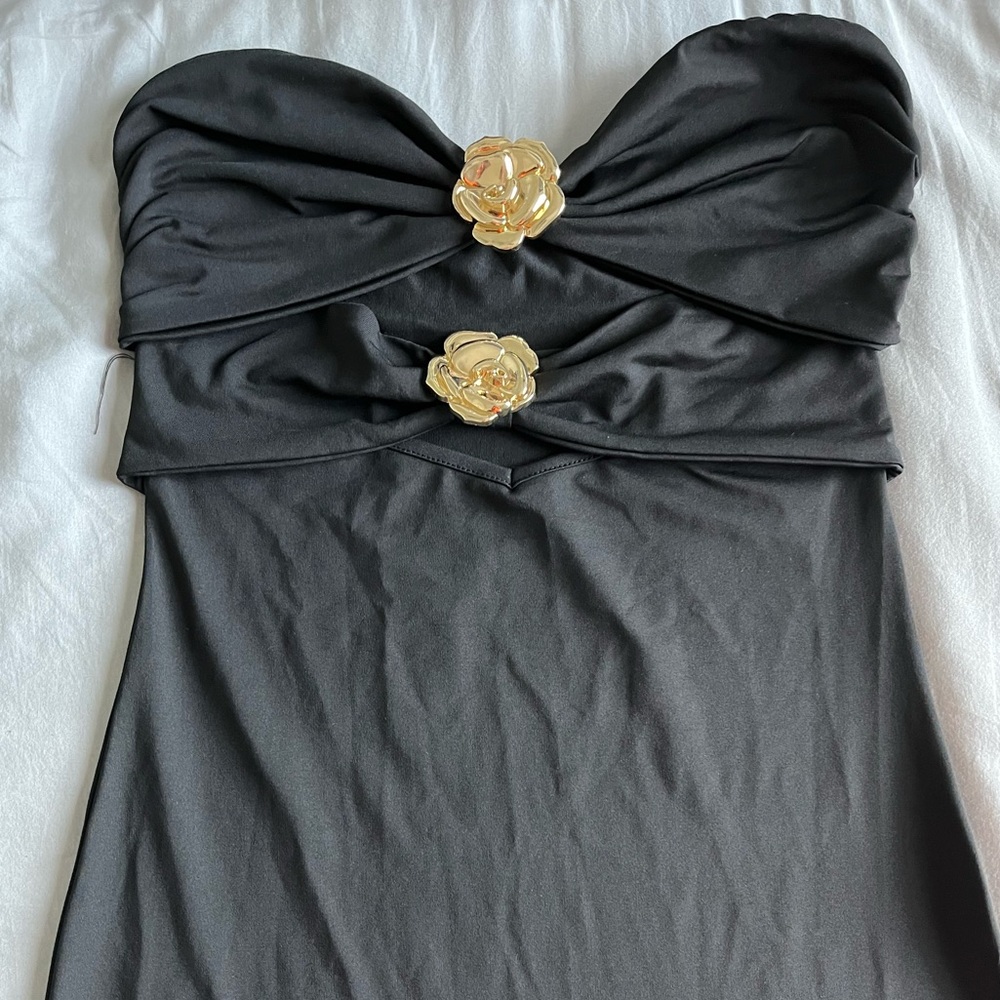 Elegant Black Dress with Gold Accents